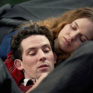 A woman looks at a man in 'Mothering Sunday.'