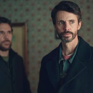 Two men stand in a room in 'Dept. Q.'