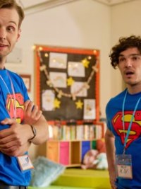 Two men stand in a playroom in 'Lost Boys and Fairies.'