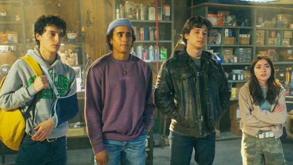 4 teens stand in a garage in 'Motorheads.'