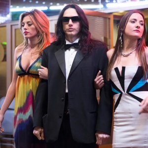 A man walks with two women in 'The Disaster Artist.'