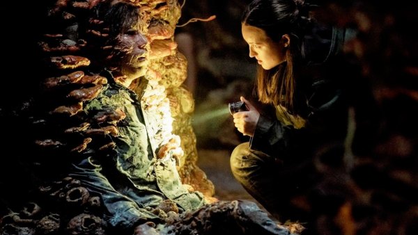 Ellie shines a flashlight on a monster in 'The Last of Us' season 2.