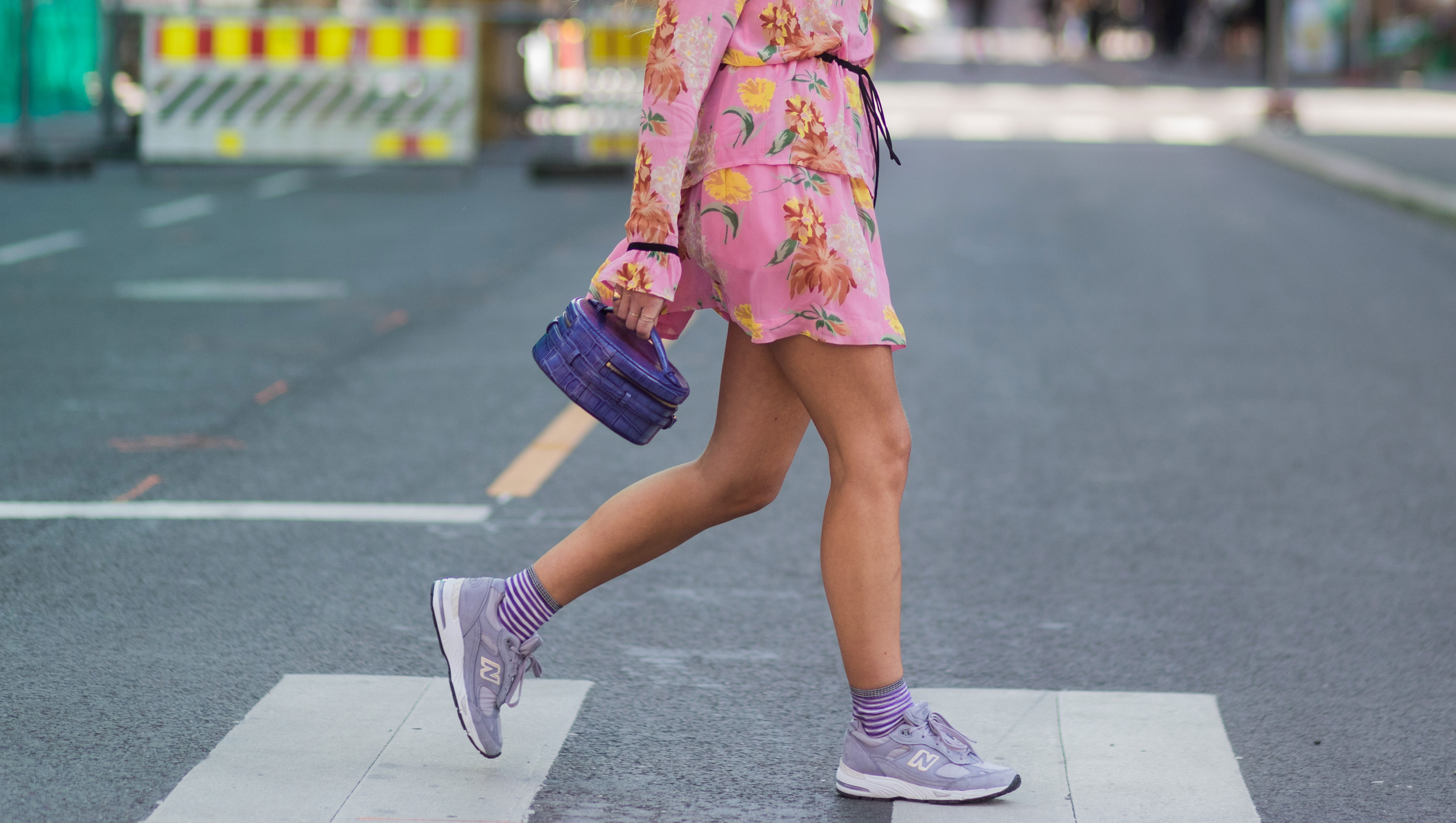 OSLO, NORWAY - AUGUST 22: Emili Sindlev wearing a pink dress with floral print, sneakers, striped socks outside Moods of Norway on August 22, 2017 in Oslo, Norway. (Photo by Christian Vierig/Getty Images)