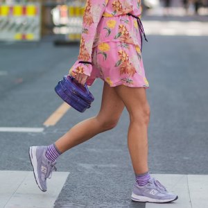 OSLO, NORWAY - AUGUST 22: Emili Sindlev wearing a pink dress with floral print, sneakers, striped socks outside Moods of Norway on August 22, 2017 in Oslo, Norway. (Photo by Christian Vierig/Getty Images)