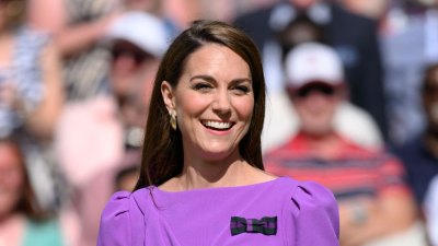 LONDON, ENGLAND - JULY 14: Catherine, Princess of Wales on court to present the trophy to the winner of the men's final on day fourteen of the Wimbledon Tennis Championships at the All England Lawn Tennis and Croquet Club on July 14, 2024 in London, England. (Photo by Karwai Tang/WireImage)