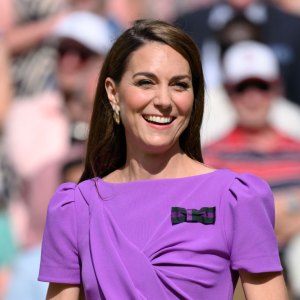 LONDON, ENGLAND - JULY 14: Catherine, Princess of Wales on court to present the trophy to the winner of the men's final on day fourteen of the Wimbledon Tennis Championships at the All England Lawn Tennis and Croquet Club on July 14, 2024 in London, England. (Photo by Karwai Tang/WireImage)