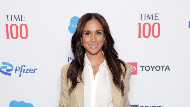 meghan markle enjoys the beach in a flowing white dress Meghan Markle's beach vibe: Duchess of Sussex dons flowy all-white outfit as she frolics on the sand in new Instagram video teasing upcoming project