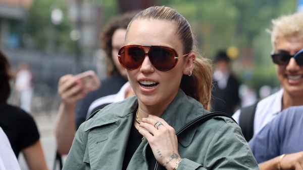 Miley Cyrus arriving at St Pancras International Eurostar from Paris on June 20, 2025 in London, England.