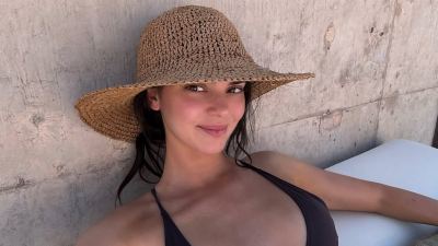 Kendall Jenner Sizzles in a Bum-Baring Bikini While Flexing Her Abs