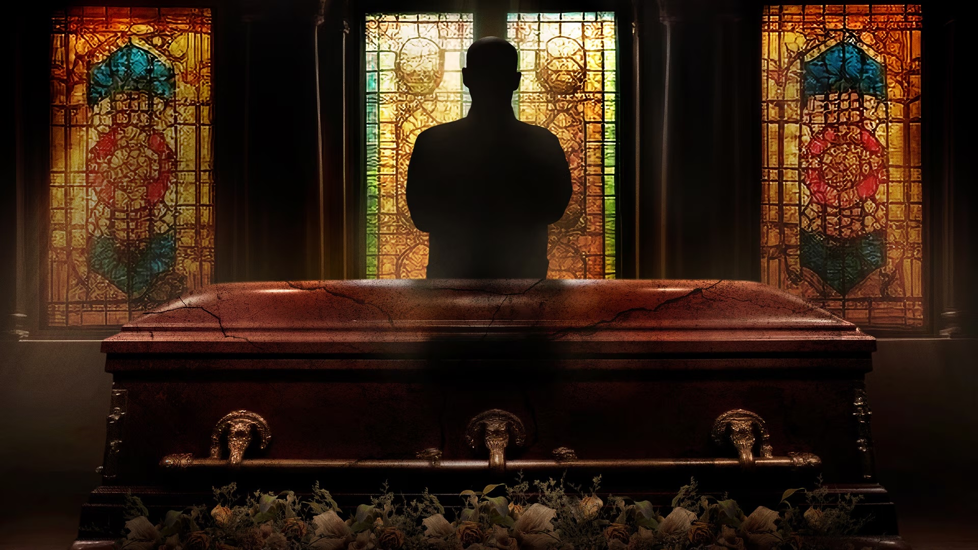 A man stands in front of a window in a funeral home in HBO's The Mortician