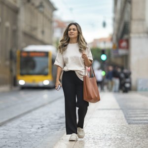 Tourist waiting for a bus in Lisbon
