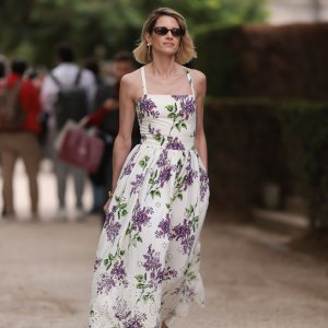 PARIS, FRANCE - JULY 05: Helena Bordon seen outside Elie Saab show wearing black small sunnies, shoulder strap white lace dress with lilac flower details and lilac heels during the Haute Couture Fall/Winter 2023/2024 as part of Paris Fashion Week on July 05, 2023 in Paris, France. (Photo by Jeremy Moeller/Getty Images)
