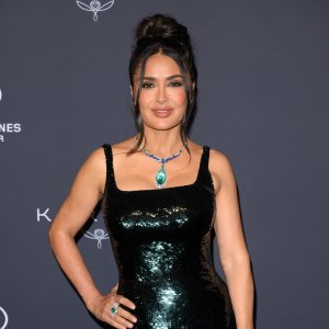 Salma Hayek Playfully Unties Her Bikini Bottoms While Dancing on a Balcony