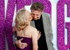 Pamela Anderson kisses Liam Neeson's naked gun in the UK Premiere