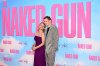 Pamela Anderson kisses Costar Gun Naked Liam Neeson in the UK Premiere Smile