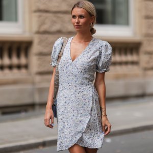 DUSSELDORF, GERMANY - AUGUST 07: Scarlett Gartmann wearing Neo Noir flower mini dress and Majavia blue bag on August 07, 2021 in Dusseldorf, Germany. (Photo by Jeremy Moeller/Getty Images)