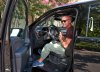 Tim McGraw unveils a newly shaved head showing torn muscles in Nashville truck