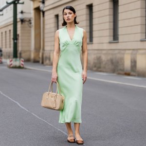 BERLIN, GERMANY - MAY 05: Lea Naumann wears mint green sleeveless dress : ottod'Ame, beige bag Prada, brown silk heels Prada on May 05, 2024 in Berlin, Germany. (Photo by Christian Vierig/Getty Images)