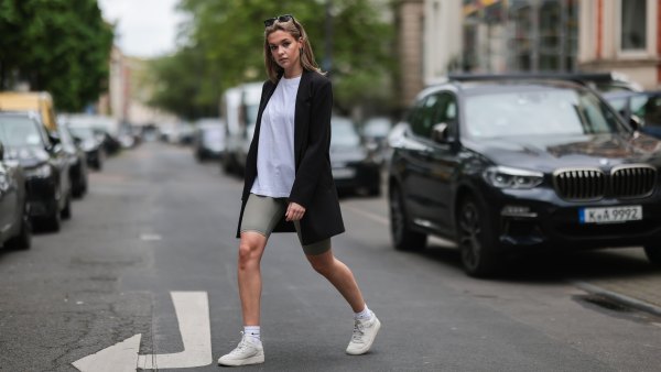 COLOGNE, GERMANY - MAY 12: Tessa Augstein wearing black Vero Moda blazer, white H&M shirt, grey Zara biker shorts, white Nike logo socks and offwhite Copenhagen studios sneakers via The Wants Shoes on May 12, 2021 in Cologne, Germany. (Photo by Jeremy Moeller/Getty Images)