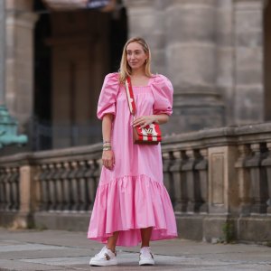 BERLIN, GERMANY - JULY 06: Sonia Lyson wearing Louis Vuitton bag, white Dior ID sneakers and pink H&M maxi dress on July 06, 2021 in Berlin, Germany. (Photo by Jeremy Moeller/Getty Images)