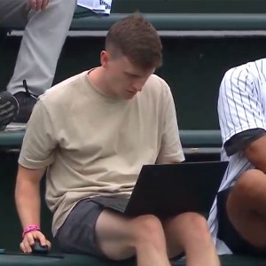 Chicago Cubs Fan Goes Viral For Working on His Laptop In Bleachers During Game