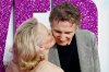 GETTYIMAGES-2226516664-Pamela-anderson-Neeeson-Kiss