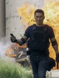 Daniel Dae Kim walks away from an explosion in Butterfly