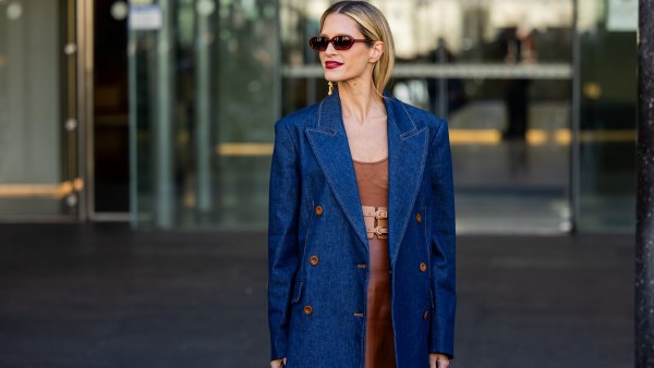 Helena Bordon wears denim blazer, brown dress, sunglasses, golden earrings outside Zimmermann during the Womenswear Fall/Winter 2024/2025 as part of Paris Fashion Week on March 04, 2024 in Paris, France.