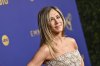 詹妮弗·安妮斯頓(Jennifer Aniston)和他的男朋友吉姆·柯蒂斯(Jim Curtis)在紐約參加晚餐