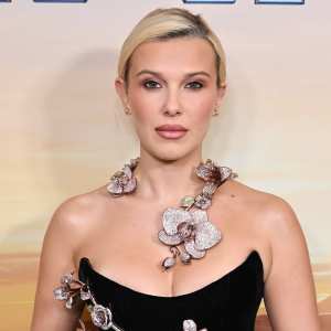 GettyImages-2204639760 Millie Bobby Brown Plays College Student in Just Picture It 1st Look
