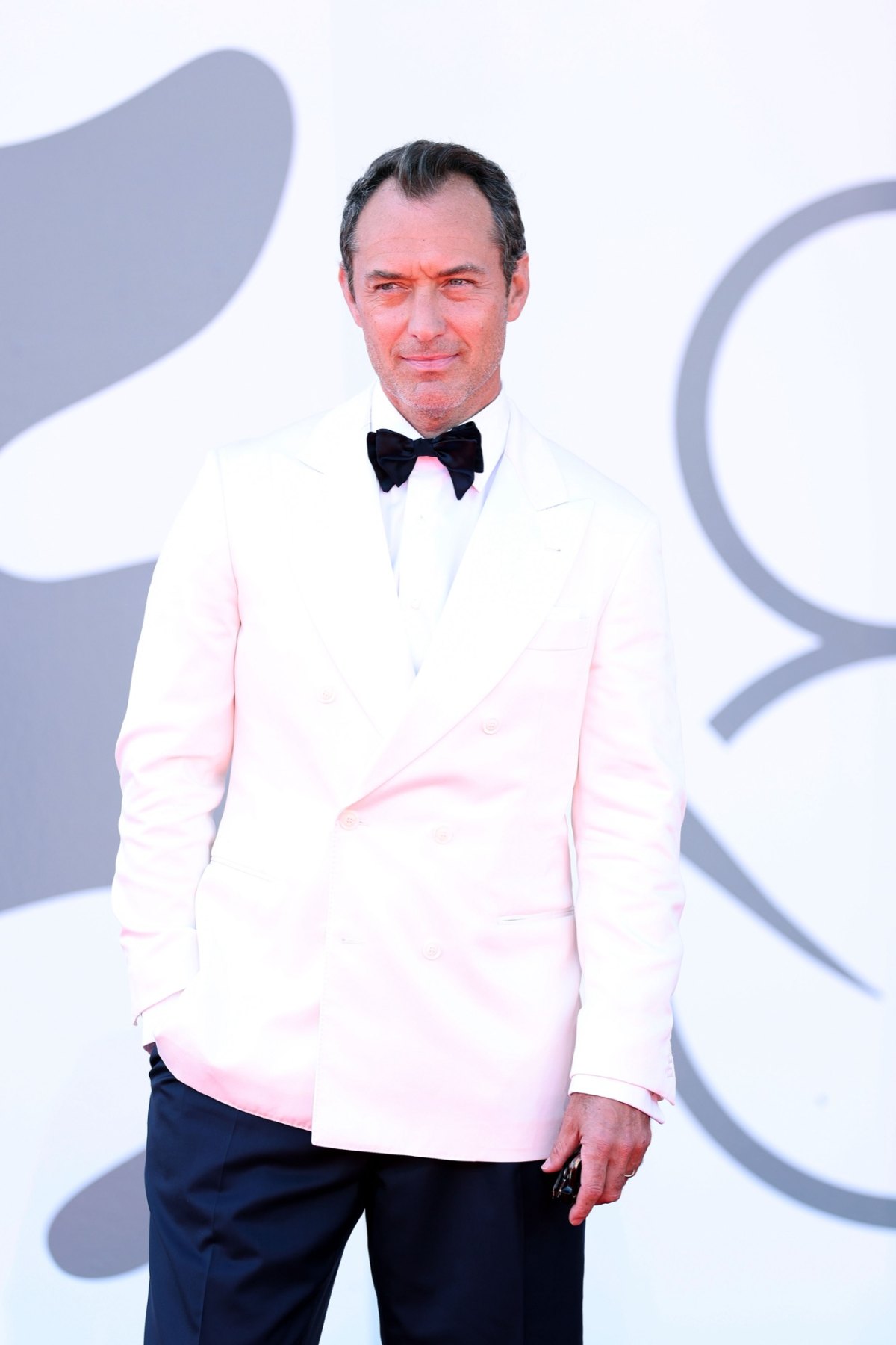 GettyImages2233033537 Jude Law Slips and Takes a Tumble While Getting Off Water Taxi in Venice