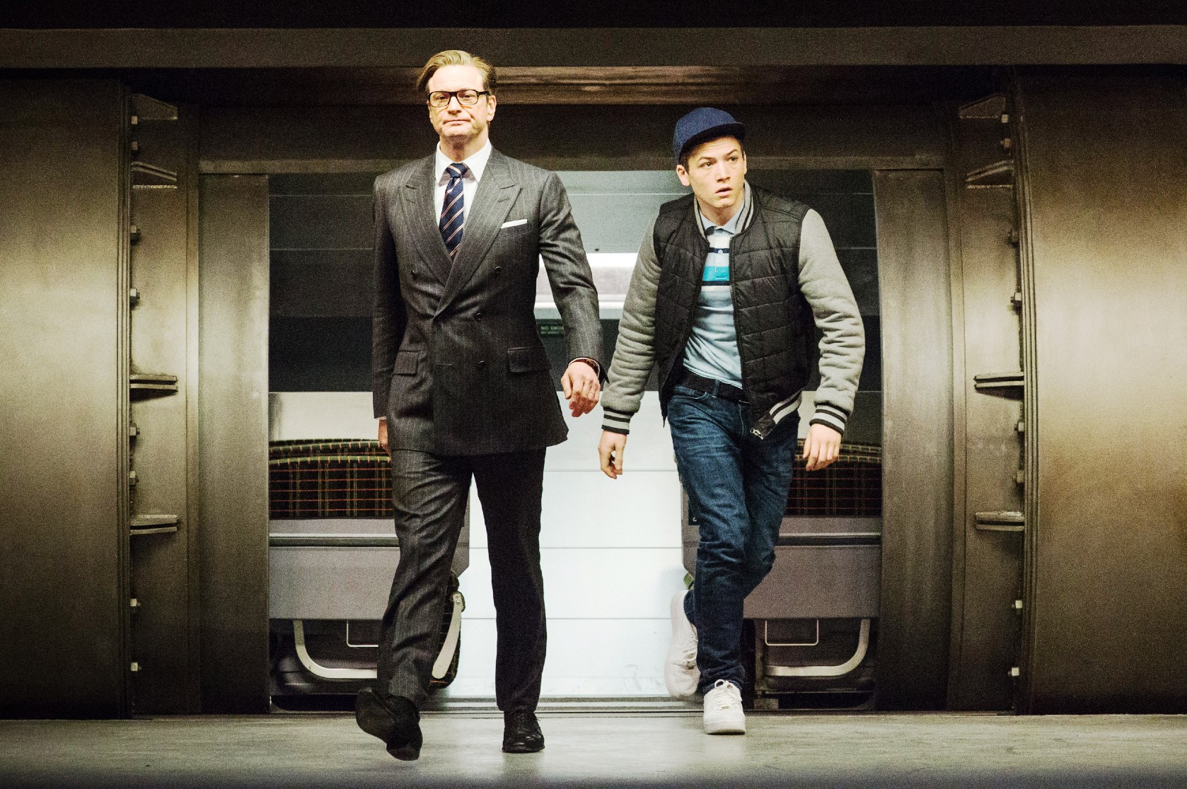 Colin Firth and Taron Egerton in Kingsman: The Secret Service