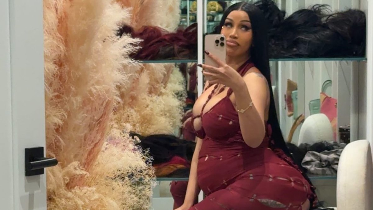 cardi b grey sheer dress Cardi B uses 'TikTok hack' to alter her dress on plane without stylist