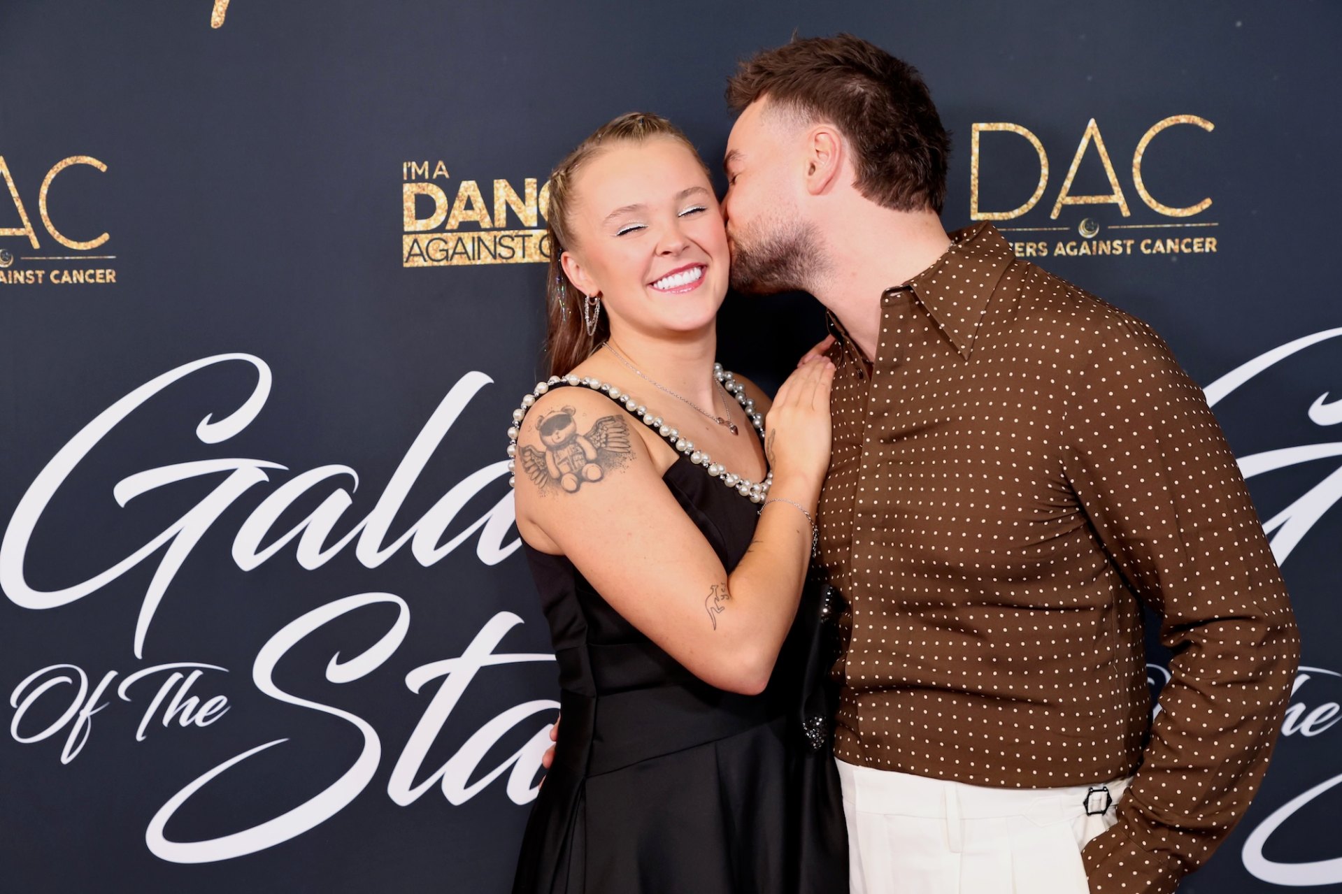 JoJo Siwa Makes Red Carpet Debut With Boyfriend Chris Hughes | Us Weekly