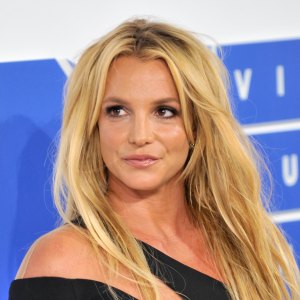 Britney Spears smirking on the red carpet at the 2016 MTV Video Music Awards.