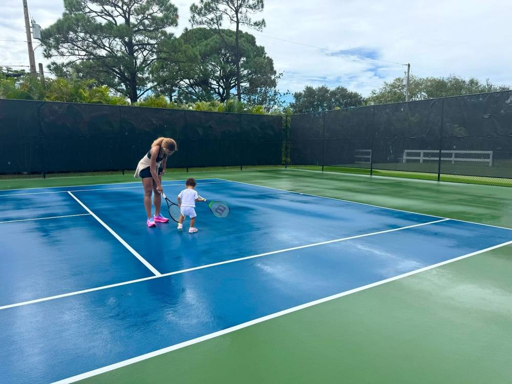 Serena Williams Takes to the Tennis Court With Youngest Daughter Adira