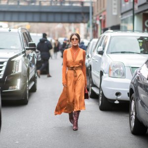 NEW YORK, NEW YORK - FEBRUARY 10: Camila Coelho is seen wearing orange turtleneck, belted dress outside Tibi during New York Fashion Week Autumn Winter 2019 on February 10, 2019 in New York City. (Photo by Christian Vierig/Getty Images)