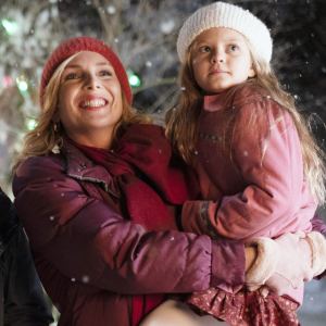 Steve Zahn, June Diane Raphael and Bellaluna Resnick in 8-Bit Christmas