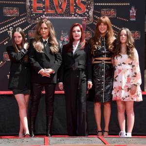 GettyImages1404262891 Lisa Marie Presleys Twin Daughters Are All Grown Up in Rare Family Photo