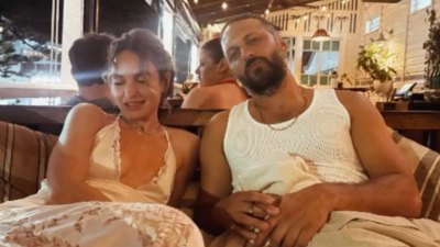 Lily James Stuns in a White Lace Naked Dress in Australia