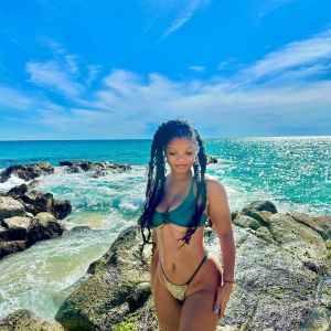 Halle Bailey Shows Off Her Underboob in a Sexy Bikini on Tropical Trip