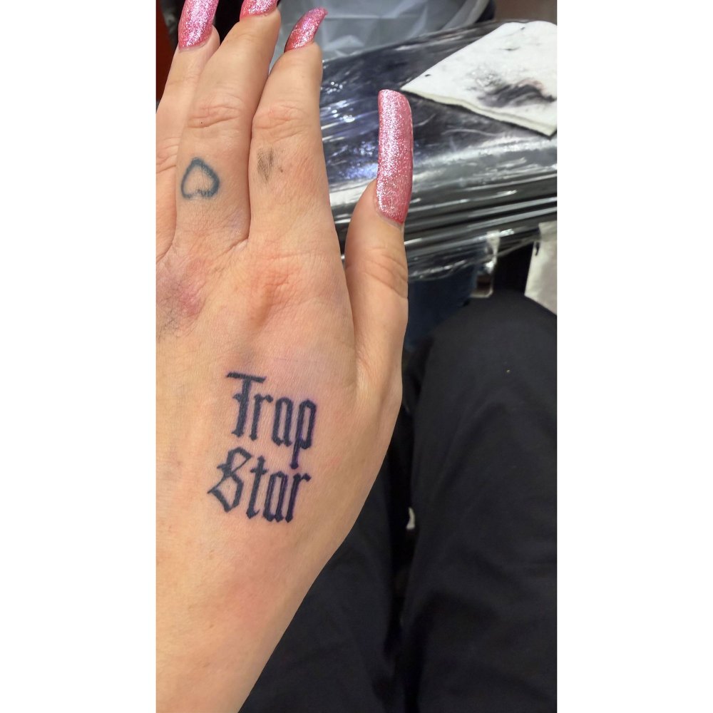 Amanda Bynes Shows Off New Trap Star Hand Tattoo as She Dons Blue Lipstick 2