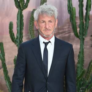 Sean Penn Smokes at Golden Globes After Nikki Glaser's 'Leather Handbag' Joke