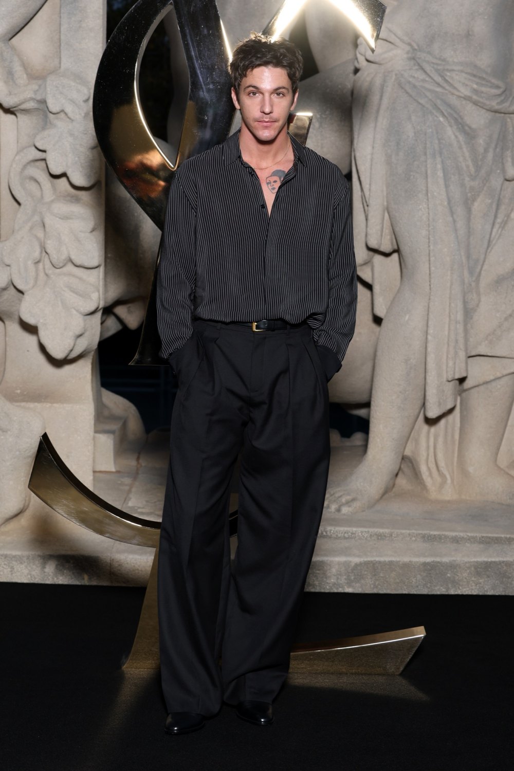 GettyImages2238148744 Who Is Role Model What to Know About the Singer Linked to Dakota Johnson