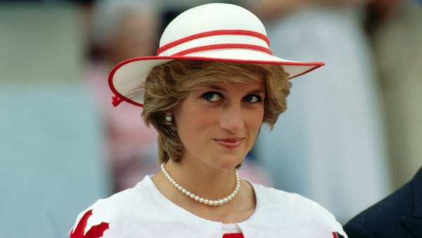 Diana, Princess of Wales, wears an outfit in the colors of Canada during a state visit to Edmonton, Alberta, with her husband.