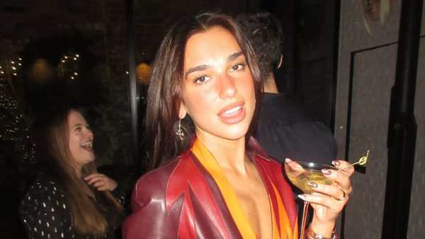 Dua Lipa Stuns in a Sheer Silver Naked Dress to Ring in 2026