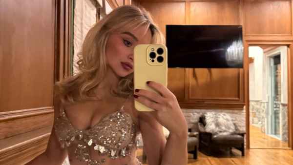 Sabrina Carpenter Shows Off a Silver Thong Underneath Her Glittering Naked Dress