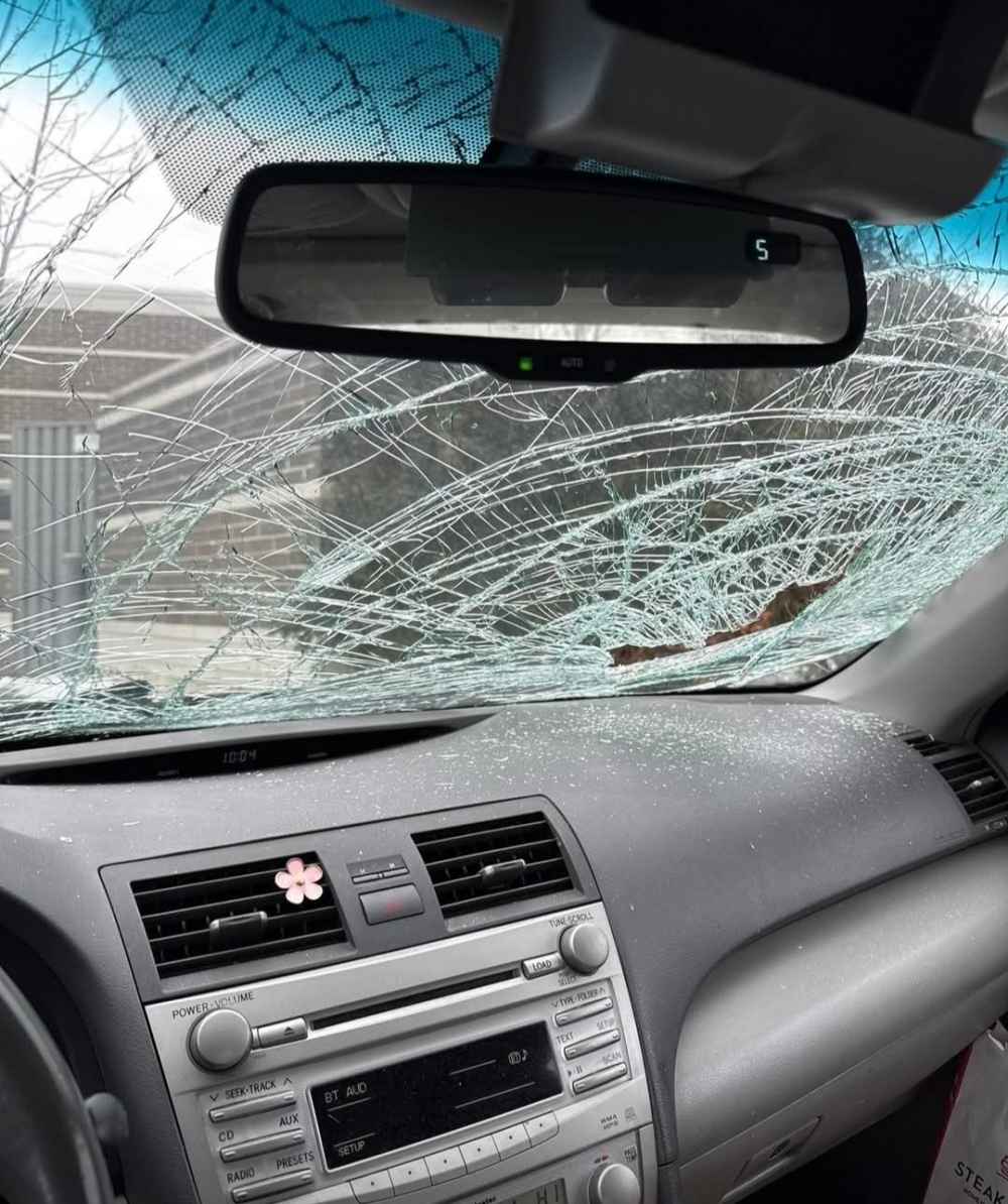 A photo showing the smashed windshielf