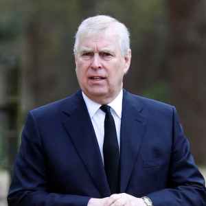 GettyImages-1232242930Prince-Andrew-Throws-a-Breast-Shaped-Ball-to-a-Toddler-in-Resurfaced-Photos.jpg