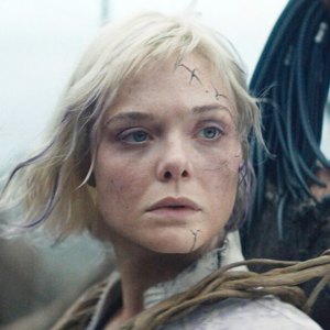 Elle Fanning and Dimitrius Schuster-Koloamatangi in Predator: Badlands